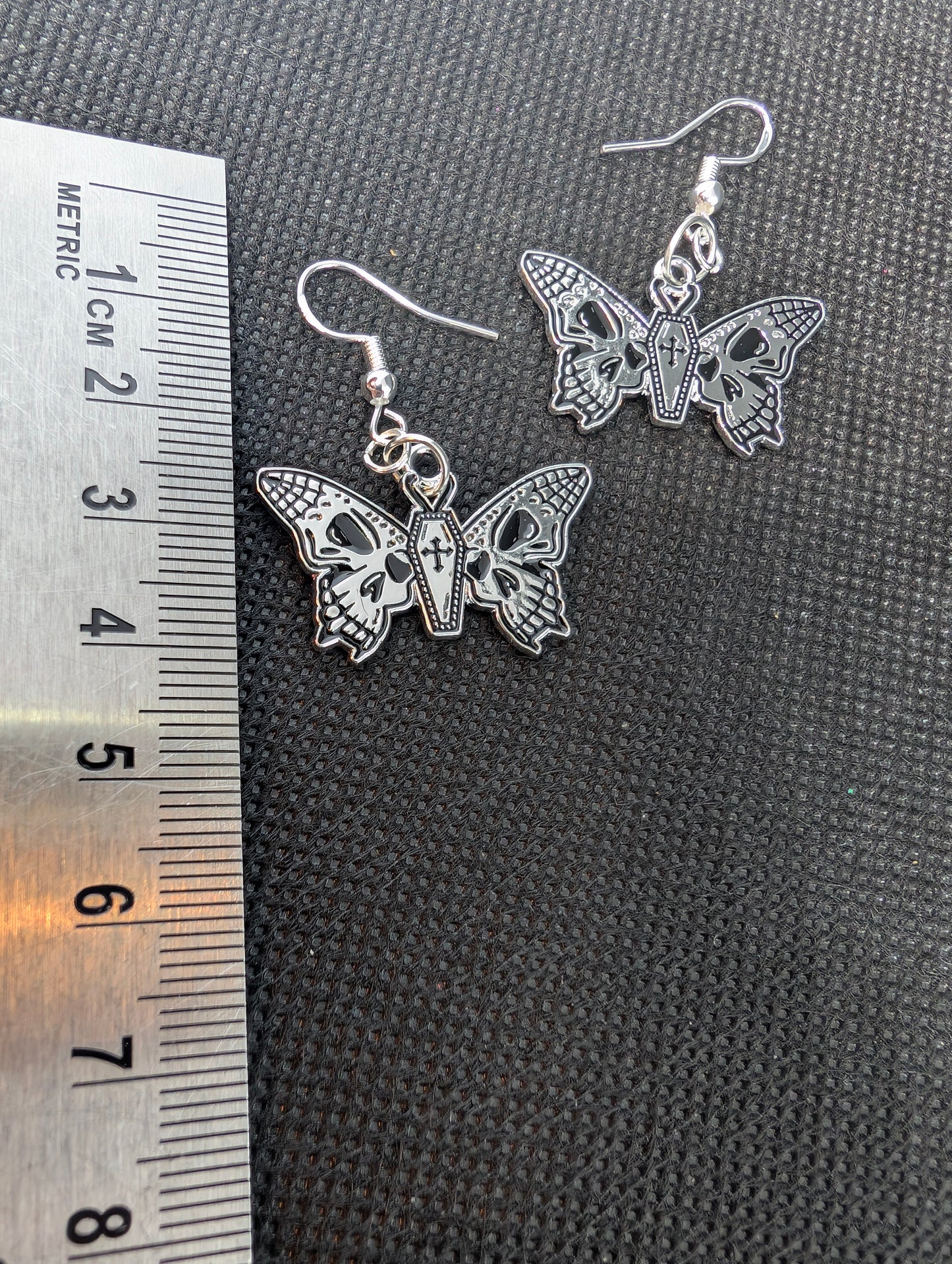 Skull moth earrings