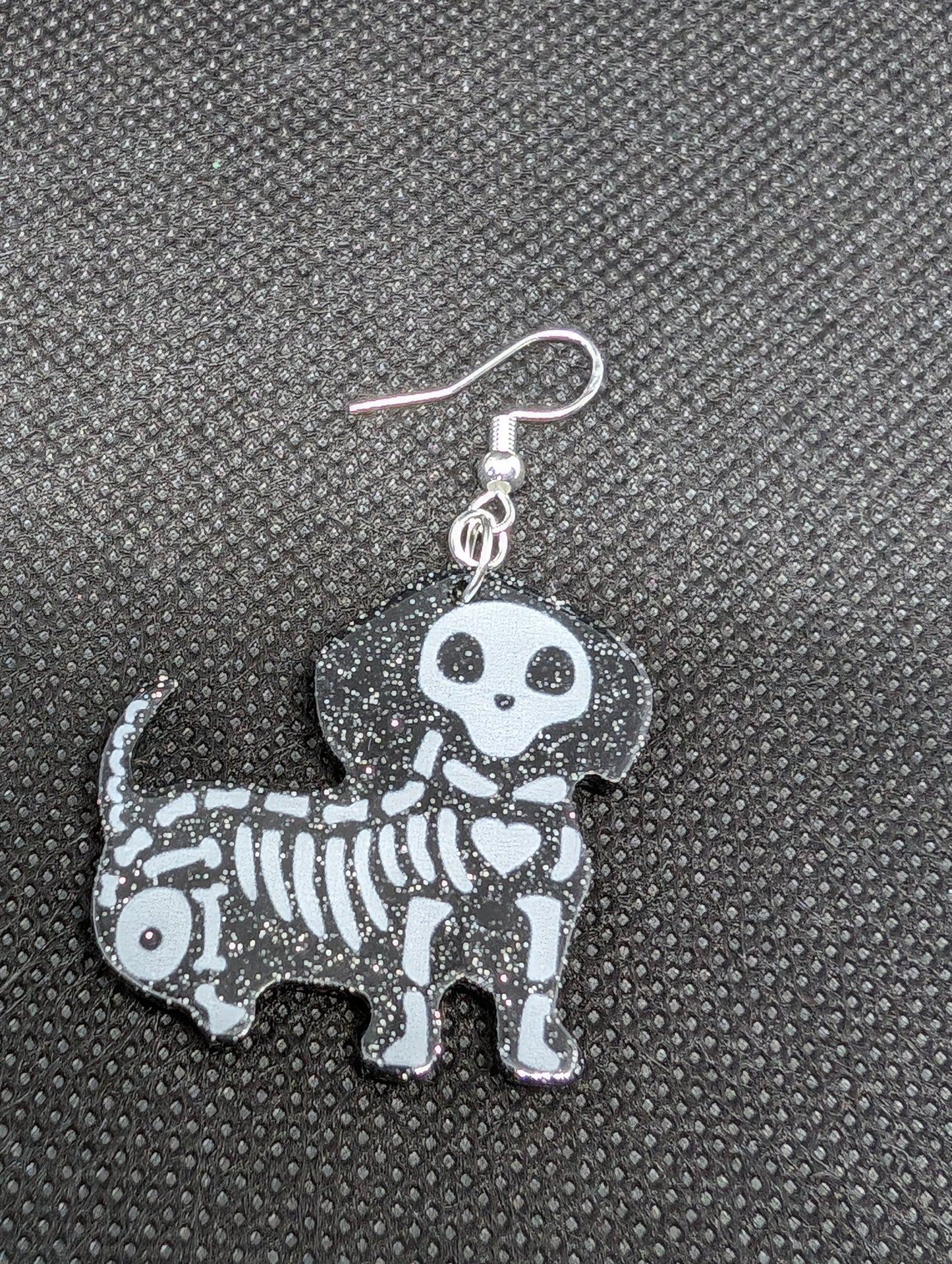 Skeleton dog earrings